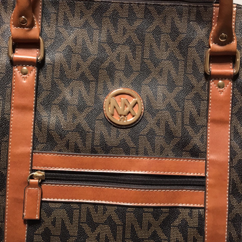NX signature logo weekender, fully lined with inside zipper pocket. - Picture 3 of 9